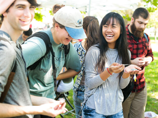 students outside laughing