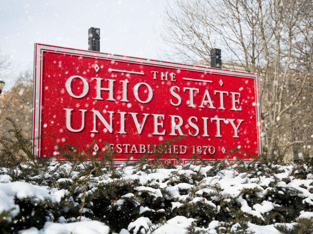 The Ohio State University Sign in red with snow